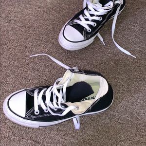 Black and white high top converse
